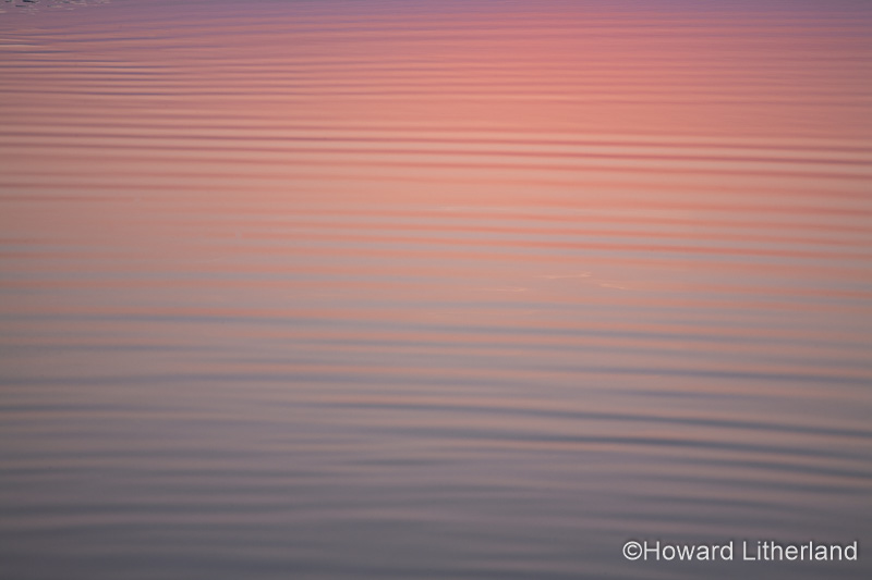Sunset colours in a tidal pool, Talacre, North Wales