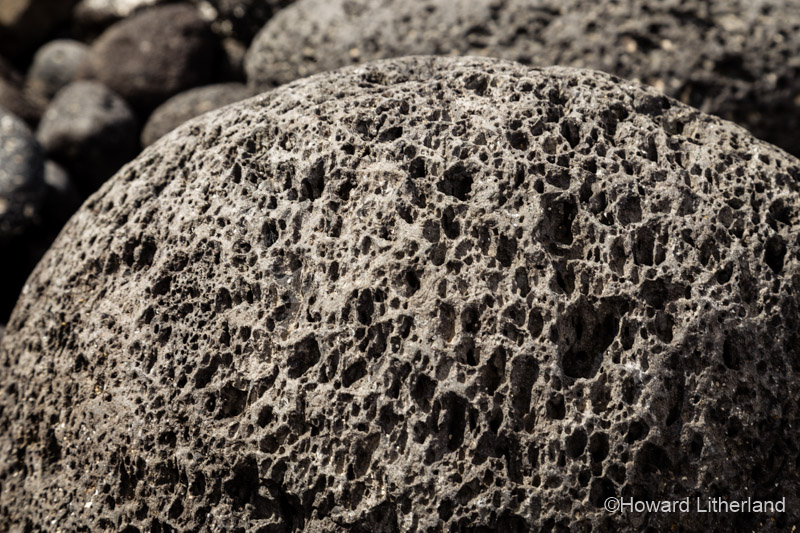 Porous volcanic rock on the beach near Los Abrigos on the south coast of Tenerife in the Canary Islands