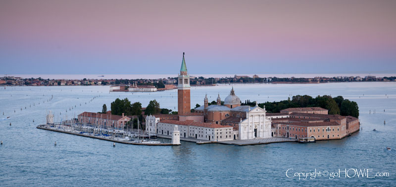 San Giorgio Maggiore viewed from the top of the clock tower at dusk in St Mark's Square, Venice