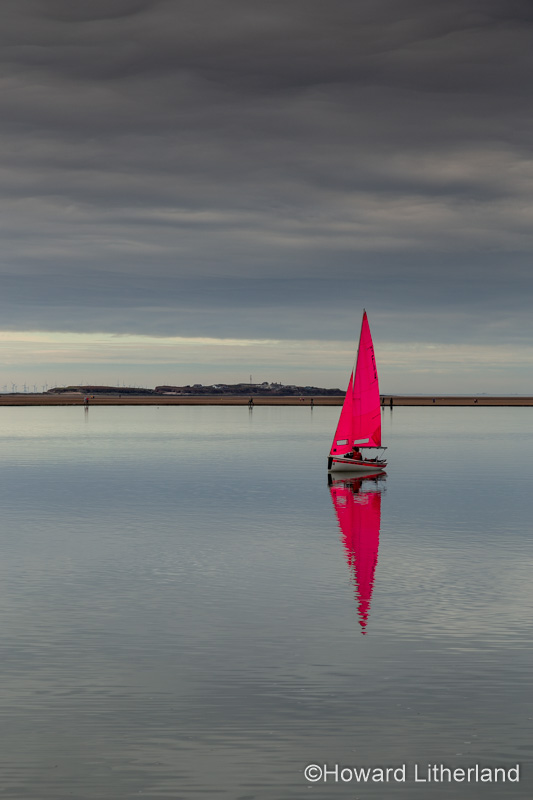 Dinghy sailing on the Marine Lake at West Kirby, Wirral, England