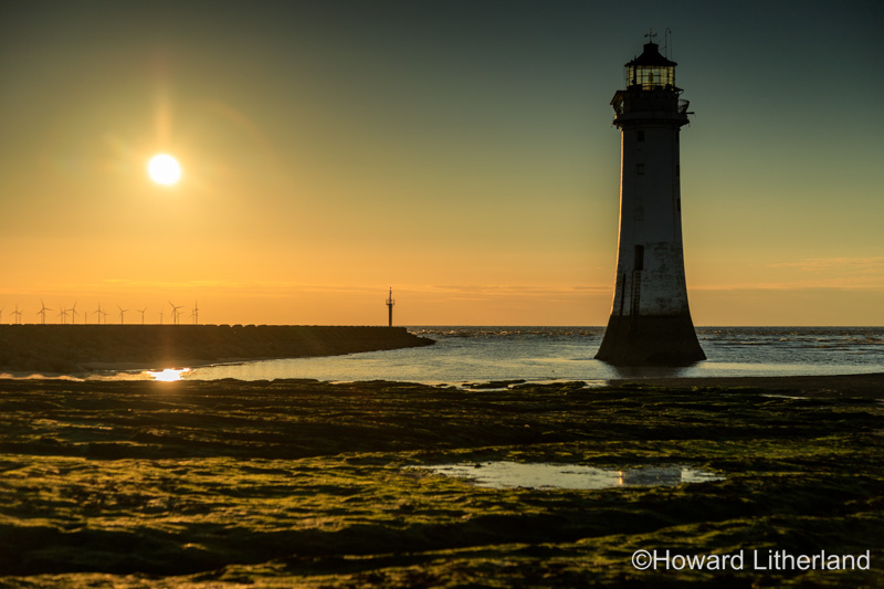 Sunset over the lighthouse at new Brighton, Wirral, Merseyside, England
